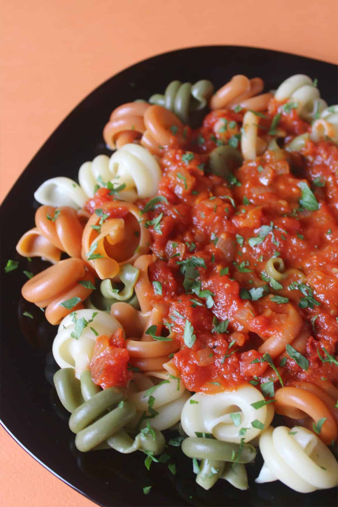 slow cooked tomato sauce on pasta